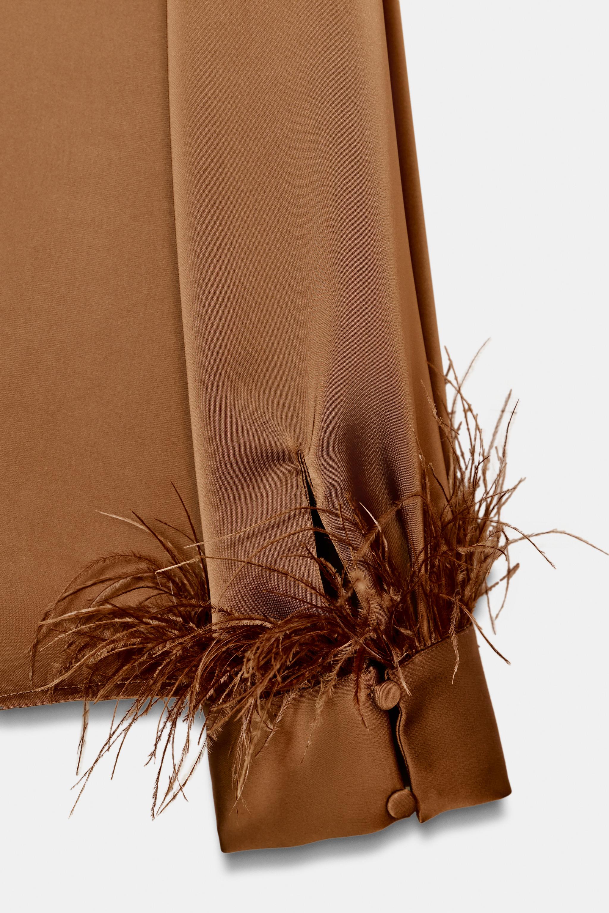 SATIN EFFECT FEATHER BLOUSE